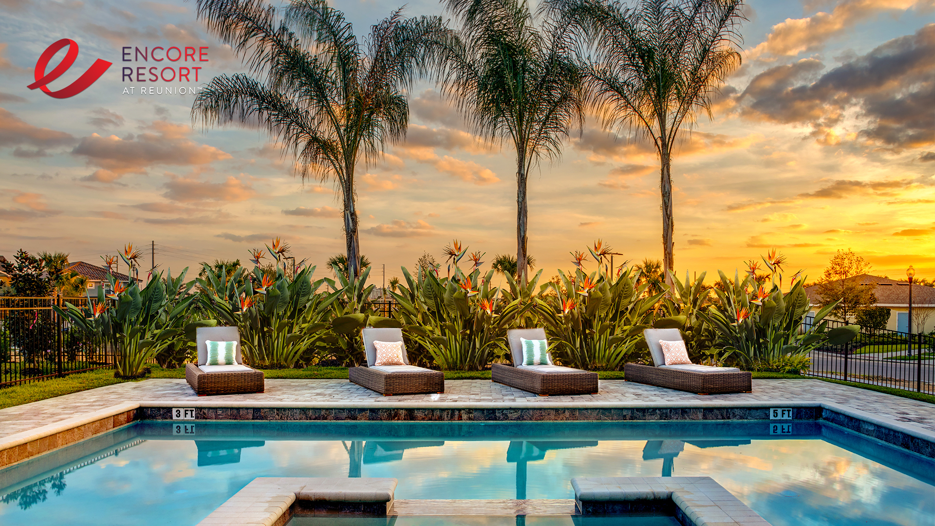 Desktop wallpaper featuring an Encore Resort vacation home private pool at sunset.