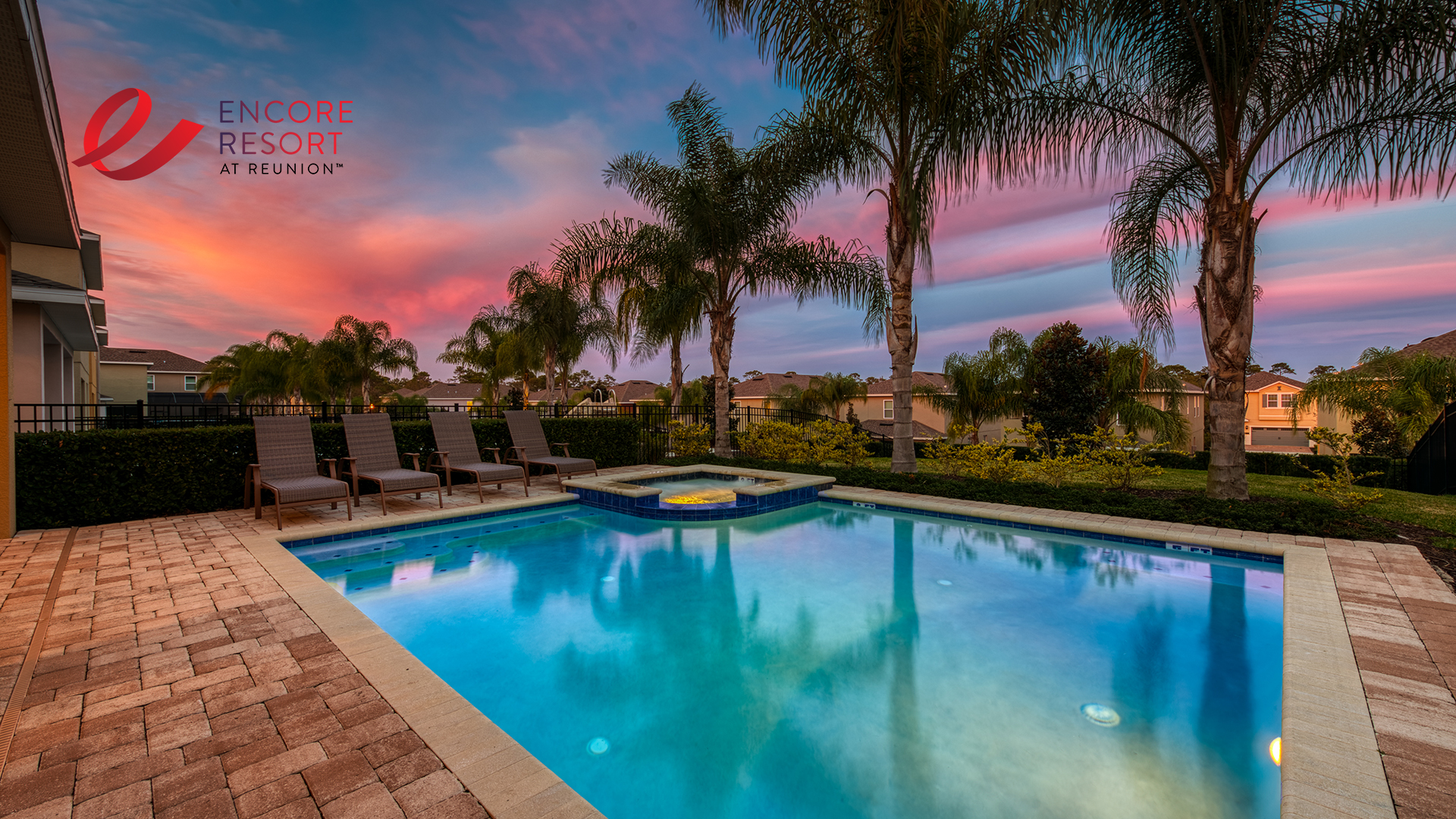 Desktop wallpaper featuring an Encore Resort vacation home private pool at twilight.