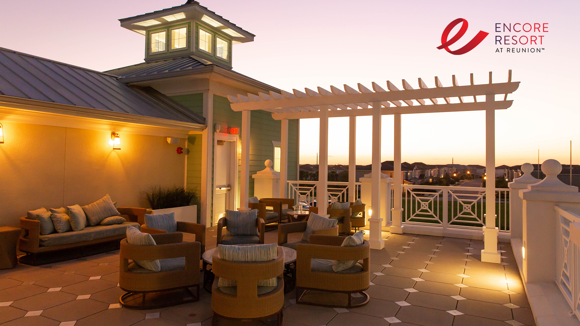 Desktop wallpaper featuring the Encore Resort Clubhouse deck at sunset.