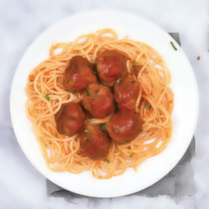 Plate of spaghetti with sauce and meatballs.