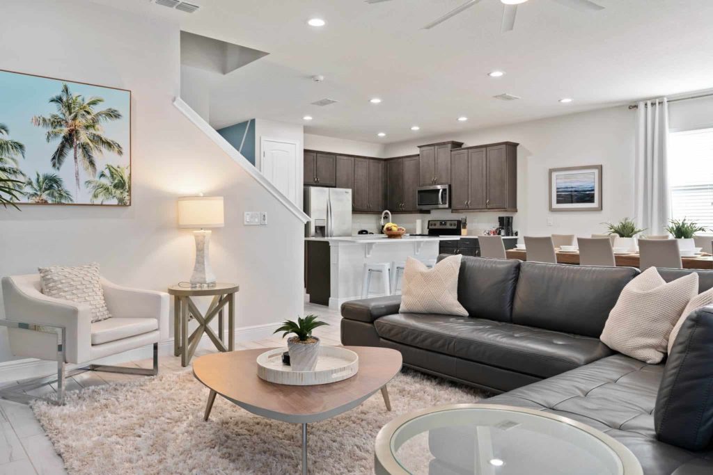 Spacious living room and kitchen in Weathers’ Orlando vacation home.