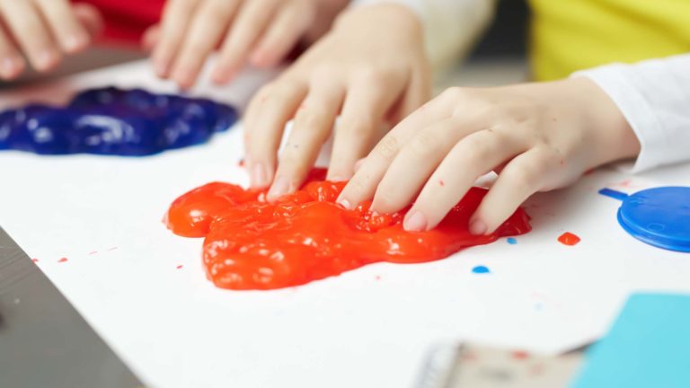 Activities Calendar 5 Kids playing with multi-color slime