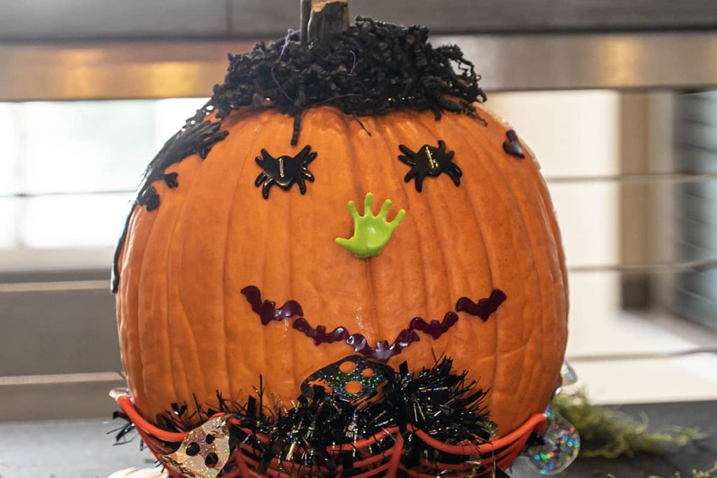 Jack-o’-lantern decorated for a Halloween pumpkin contest