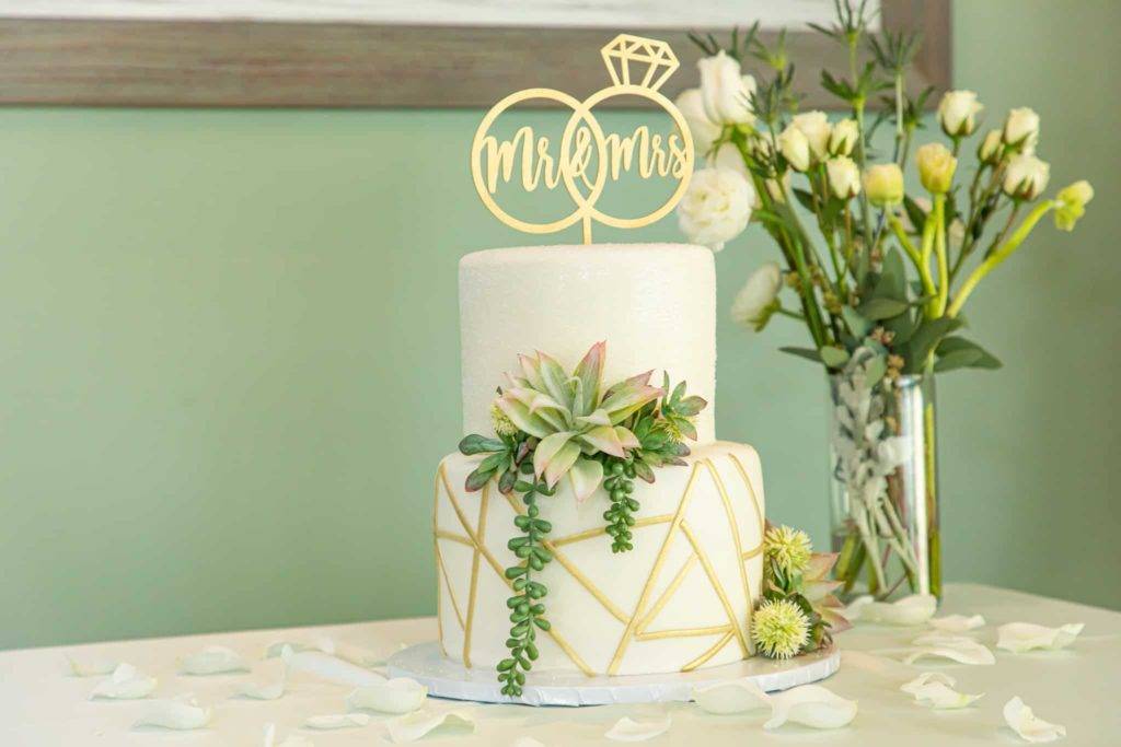 Wedding cake with Mr. and Mrs. cake topper