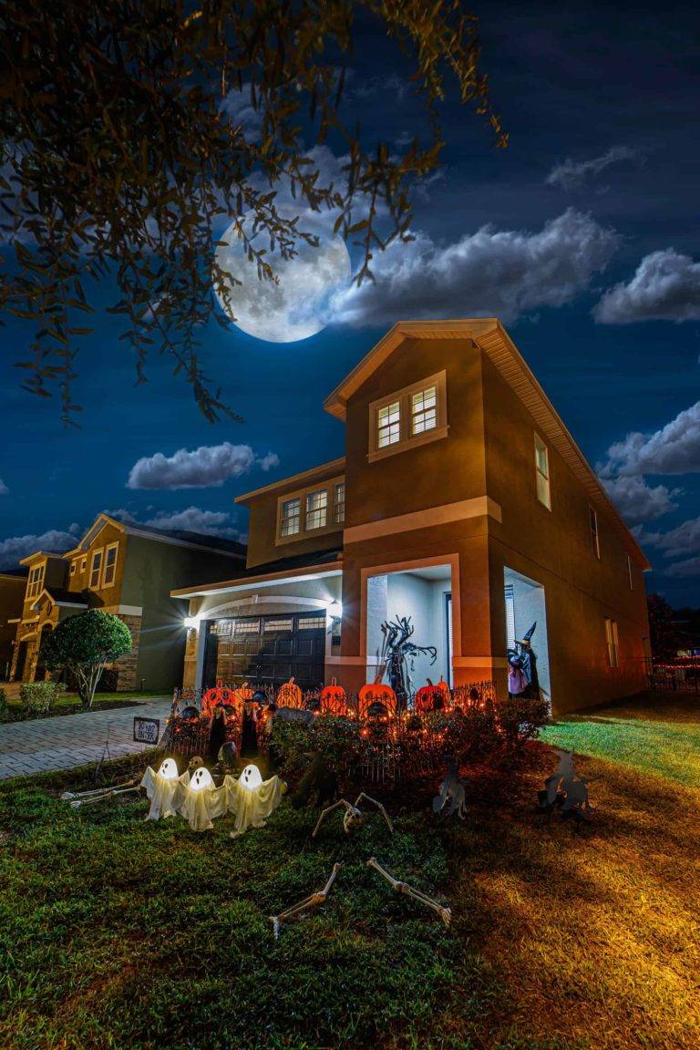 Willow’s Harvest Hollow Home: Front garden with Halloween decorations under a full moon