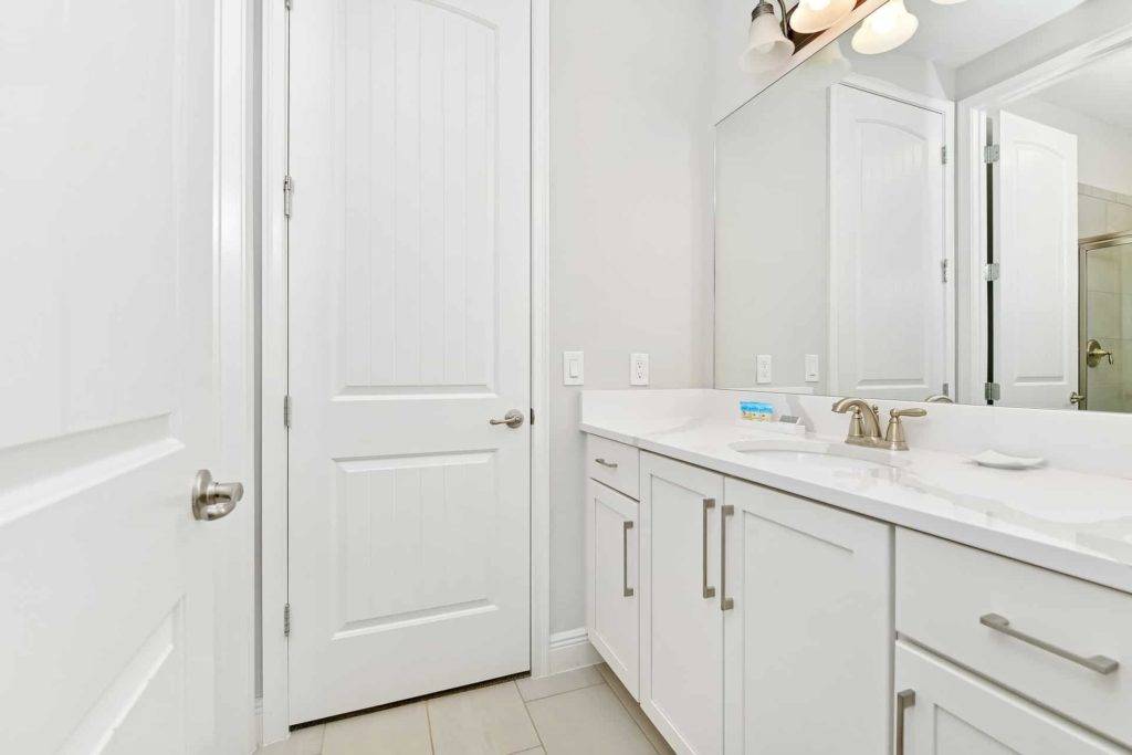 Bathroom 3 with sink and glass-door shower