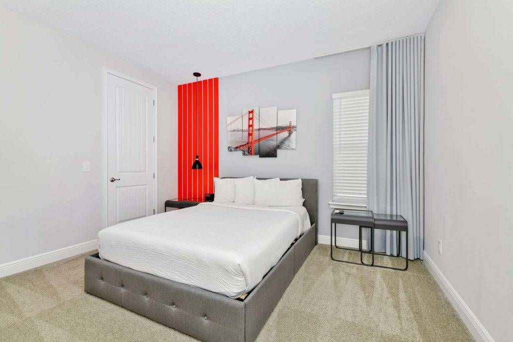 Bedroom 3 with king bed and glass-top nightstands