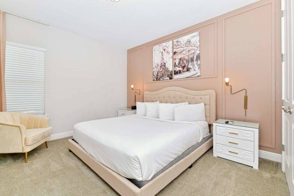 Bedroom 4 with large king bed and 2 side tables