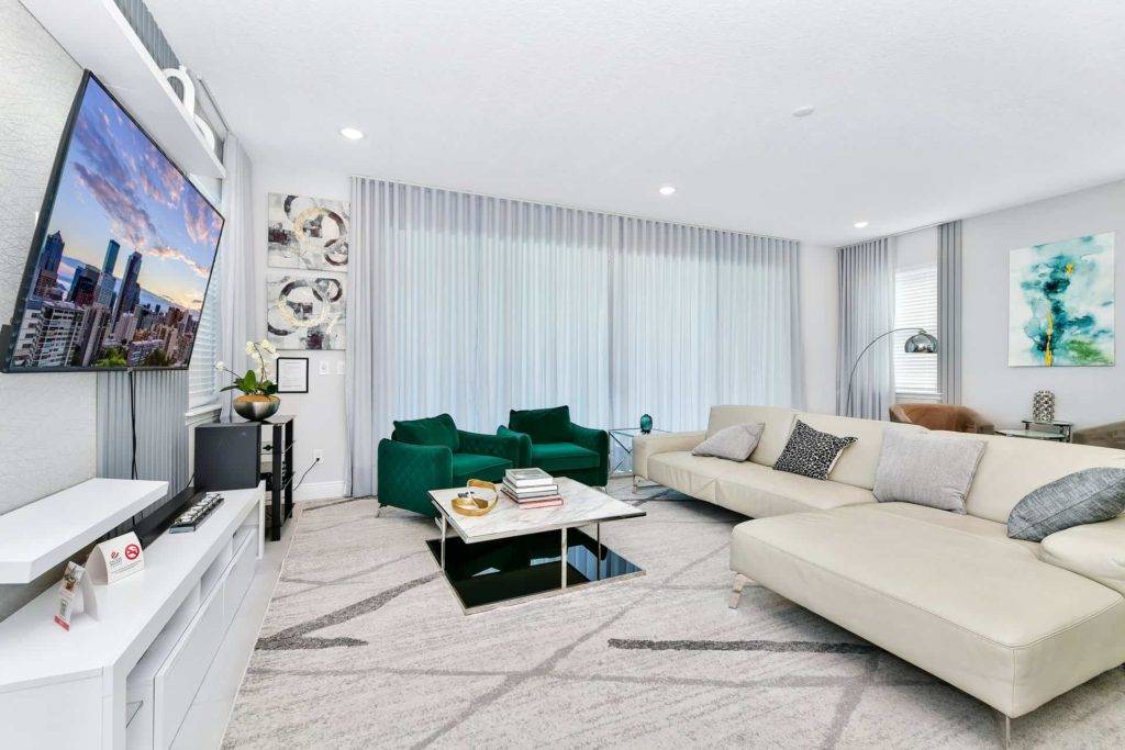 Living room with wall-mounted TV and coffee table