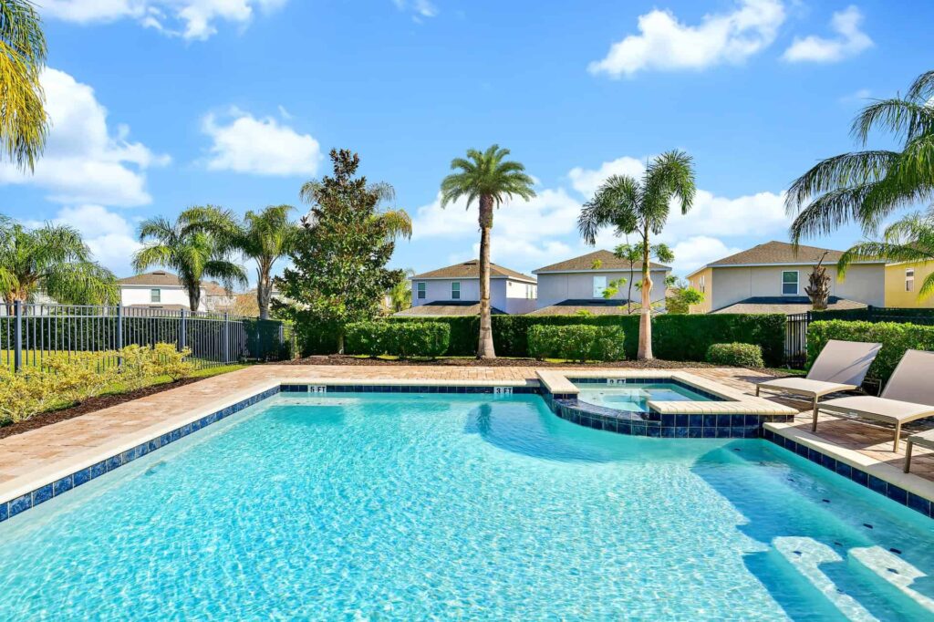 Private backyard pool, hot tub, and garden