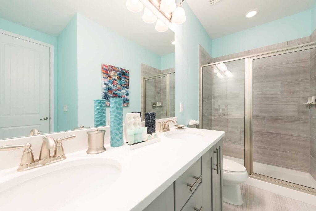 Bathroom 10 with double sinks and walk-in shower
