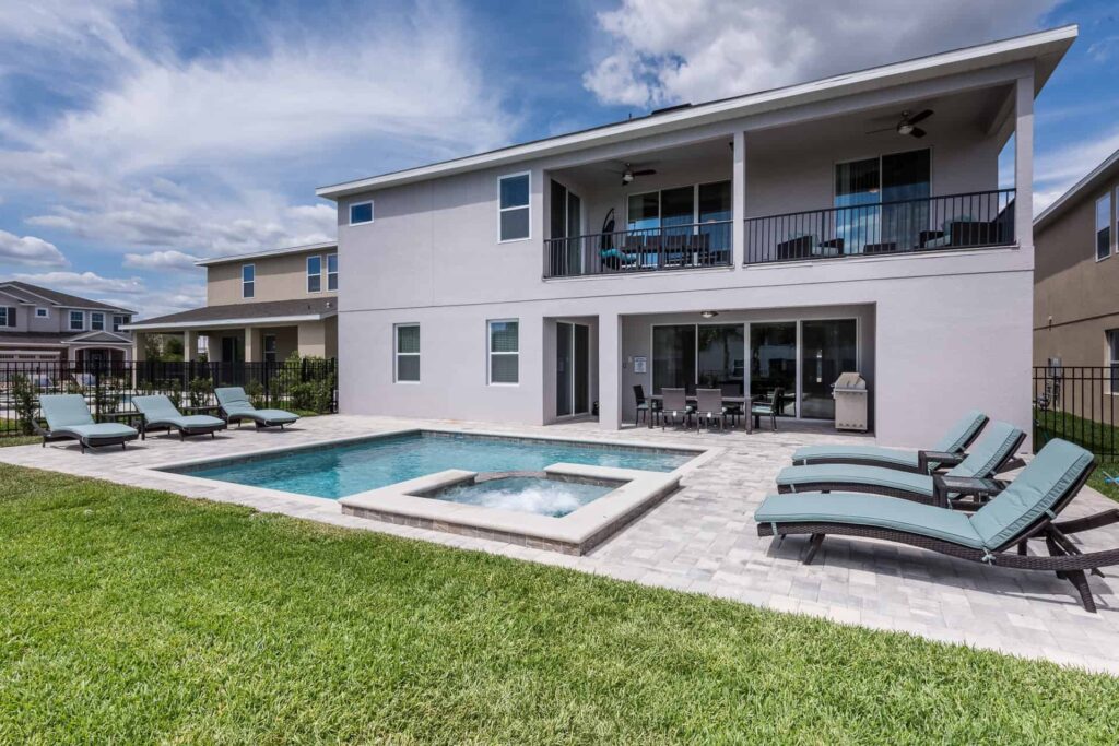 Private backyard pool, hot tub, sun loungers, covered lanai and balconies