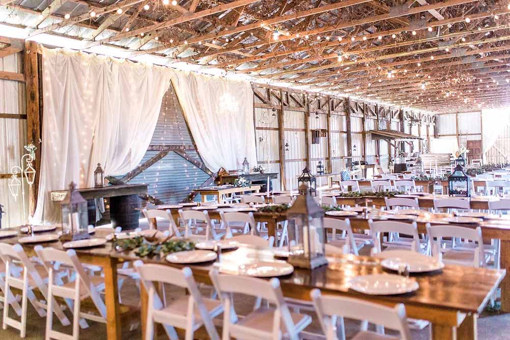 Rustic wedding reception in a barn